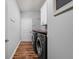 Well-equipped laundry room featuring side by side washer and dryer with wood countertop at 4034 Cairo Way, Avon, IN 46123