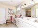 Bright bathroom with double sinks, white cabinets, large mirror, and decor for an inviting feel at 4039 Amaryllis Dr, Plainfield, IN 46168