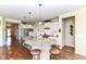 Open kitchen featuring a large granite island with bar seating and modern appliances at 4039 Amaryllis Dr, Plainfield, IN 46168