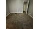 Gray painted bedroom with carpet, window and closet, offers comfort and practicality at 41 S Warman Ave, Indianapolis, IN 46222