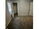 Bedroom with gray paint, closet and carpet, providing a comfortable and functional living space at 41 S Warman Ave, Indianapolis, IN 46222