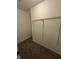 Walk-in closet features carpet and wire shelving at 41 S Warman Ave, Indianapolis, IN 46222