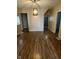 The dining area features modern lighting and wood flooring, perfect for Gathering gatherings at 41 S Warman Ave, Indianapolis, IN 46222