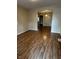 The living room has beautiful wood flooring and neutral paint, offering a welcoming atmosphere at 41 S Warman Ave, Indianapolis, IN 46222