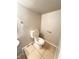 Small, tiled bathroom with toilet, flooring and neutral paint at 4144 Richelieu Rd, Indianapolis, IN 46226