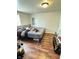 Bedroom features sleek, dark wood-look floors and natural light at 4144 Richelieu Rd, Indianapolis, IN 46226