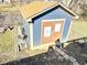 Exterior of a newly painted storage shed in the backyard of a residential home at 4144 Richelieu Rd, Indianapolis, IN 46226