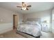 Comfortable main bedroom with carpet and light walls, decorated with white trim at 4309 Viva Ln, Indianapolis, IN 46239