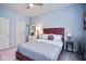 Comfortable bedroom features calming color palette, plush carpeting, a full-size bed, and decor at 5047 Skipping Stone Dr, Indianapolis, IN 46237