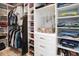 Organized walk-in closet featuring built-in shelving, drawers, and ample hanging space for clothes and accessories at 5047 Skipping Stone Dr, Indianapolis, IN 46237