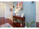 Entryway with hardwood floors and a decorative console table at 5047 Skipping Stone Dr, Indianapolis, IN 46237