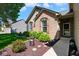 Charming home featuring a front yard with mature landscaping and a sidewalk leading to the front door at 5047 Skipping Stone Dr, Indianapolis, IN 46237