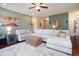 Spacious living room features a large sectional couch, area rug, and stylish decor at 5047 Skipping Stone Dr, Indianapolis, IN 46237