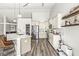 Well-appointed kitchen showcasing a central island, stainless steel appliances, and ample storage in a bright and airy space at 5622 Hare Dr, Noblesville, IN 46062