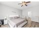 Cozy primary bedroom with a comfortable bed, neutral decor, and a crib, offering a tranquil and inviting space at 5622 Hare Dr, Noblesville, IN 46062