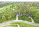 Beautiful aerial view of a brick home nestled in a lush, green neighborhood at 5948 Ridge Hill Way, Avon, IN 46123