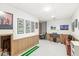 Well-lit basement area with wainscoting, golf decor, and neutral carpeting at 5948 Ridge Hill Way, Avon, IN 46123