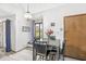 Inviting breakfast nook with black table and chairs, featuring a window with a view at 5948 Ridge Hill Way, Avon, IN 46123