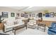 Cozy basement living room with comfortable seating, golf decor, and ample natural light at 5948 Ridge Hill Way, Avon, IN 46123