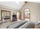 Bright main bedroom with vaulted ceilings, ensuite bathroom access, and mirrored closet at 5948 Ridge Hill Way, Avon, IN 46123
