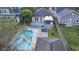 Aerial view of a backyard with swimming pool and outdoor dining on a deck at 6167 Carrollton Ave, Indianapolis, IN 46220