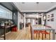 Stylish dining room showcasing a modern table, open floor plan, and decorative shelving at 6167 Carrollton Ave, Indianapolis, IN 46220