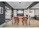 Modern dining area with seating for four, bright lighting, and an open concept at 6167 Carrollton Ave, Indianapolis, IN 46220