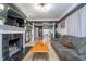 Spacious living room with fireplace, open layout, and modern decor elements at 6167 Carrollton Ave, Indianapolis, IN 46220