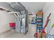 Basement features exposed ductwork and updated mechanics and ample storage space at 6191 Geneva St, Stilesville, IN 46180