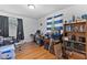 Bedroom with hardwood floors, natural light, and ample work space at 6191 Geneva St, Stilesville, IN 46180