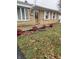 Inviting brick house front yard with landscaping and walkway to front door at 6209 Meadowlark Dr, Indianapolis, IN 46226