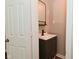 New bathroom vanity with new flooring and paint at 623 Orange St, Indianapolis, IN 46203