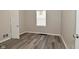 Bedroom with new flooring and neutral paint at 623 Orange St, Indianapolis, IN 46203