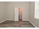 Bedroom with new flooring and neutral paint at 623 Orange St, Indianapolis, IN 46203