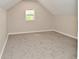 Bedroom with carpeting and a window at 623 Orange St, Indianapolis, IN 46203