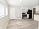 Open kitchen area, complete with new appliances and stylish flooring at 623 Orange St, Indianapolis, IN 46203