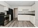 Open kitchen featuring stainless steel appliances and gray counters at 623 Orange St, Indianapolis, IN 46203