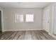 Cozy Living Room with Neutral Colors and two windows at 623 Orange St, Indianapolis, IN 46203