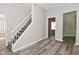 Stairwell with neutral walls and gray carpet at 623 Orange St, Indianapolis, IN 46203