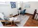 Cozy home office space with a comfortable chair, a desk, and natural light from a window at 625 Dequincy St, Indianapolis, IN 46201