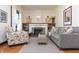 Inviting living room featuring a cozy fireplace, natural light, and comfortable seating at 625 Dequincy St, Indianapolis, IN 46201