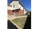 Backyard features a small patio and some grass at 6432 Commons Dr, Indianapolis, IN 46254