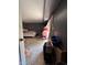 Basement featuring a bed, storage, and potential living space; open doorway at 6432 Commons Dr, Indianapolis, IN 46254