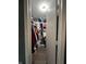Walk-in closet featuring custom shelving and ample storage space for clothing at 6432 Commons Dr, Indianapolis, IN 46254