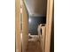Laundry room featuring a washer, dryer, and a toilet, providing convenience and functionality at 6432 Commons Dr, Indianapolis, IN 46254