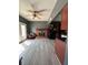 Inviting living room with brick fireplace, hardwood floors, and lots of natural light at 6432 Commons Dr, Indianapolis, IN 46254