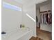 Bathroom features a soaking tub under a window and a walk-in closet for ample storage at 6903 Aster Dr, Pendleton, IN 46064
