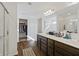 Bathroom features a double sink vanity, and a walk-in shower at 6903 Aster Dr, Pendleton, IN 46064