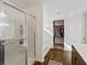 Bathroom with a glass-enclosed shower, a soaking tub, and a walk-in closet at 6903 Aster Dr, Pendleton, IN 46064