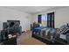 This bedroom features carpeted floors, a window with dark curtains and a ceiling light at 6903 Aster Dr, Pendleton, IN 46064